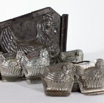 Seven tin chicken/chick molds -  Fronts, close up